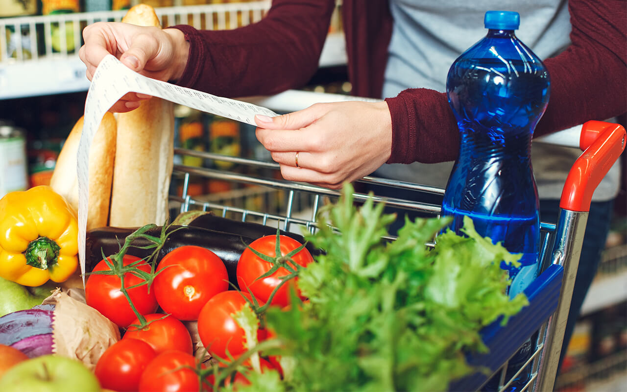 Photo of shopping cart filled with vegetables