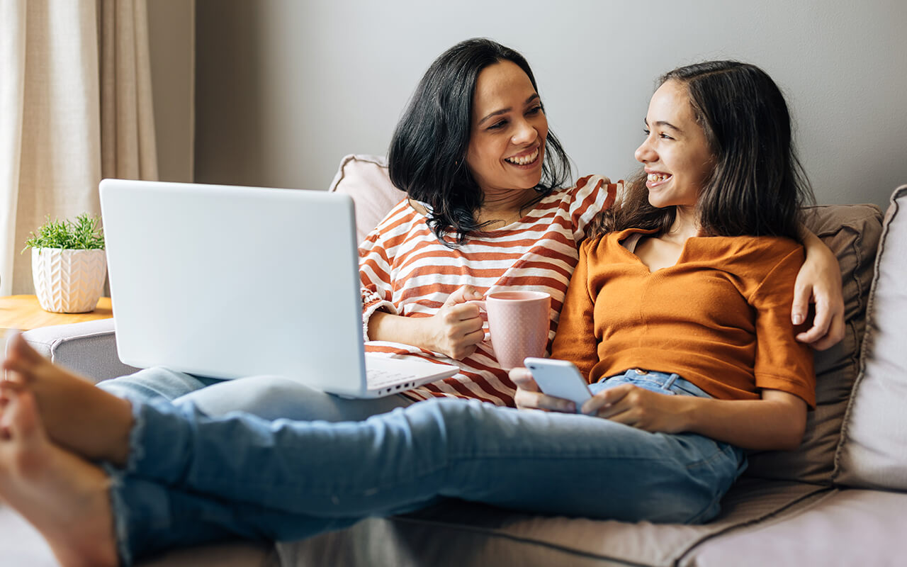 Photo of mother and daughter smiling