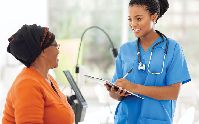 Photo of doctor speaking with patient