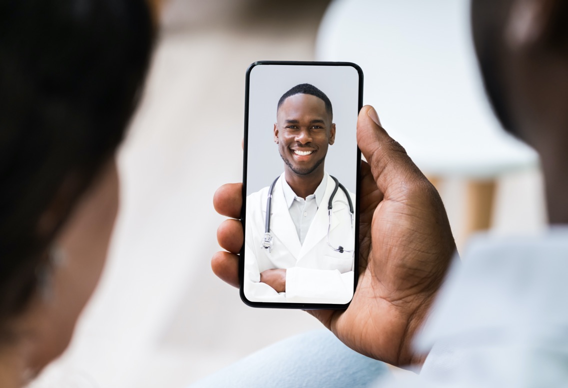 Couple talking to Doctor on phone