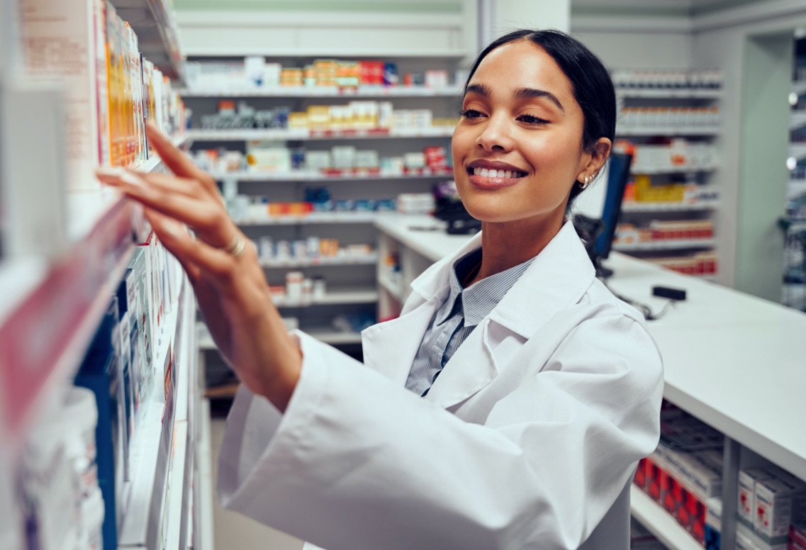 Pharmacist looking at shelf