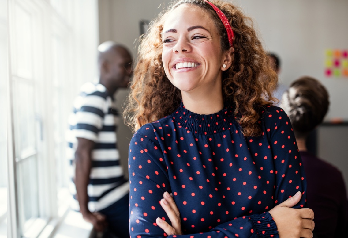 Woman in office smiling