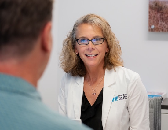 BCBSRI Care management associate speaking with a member