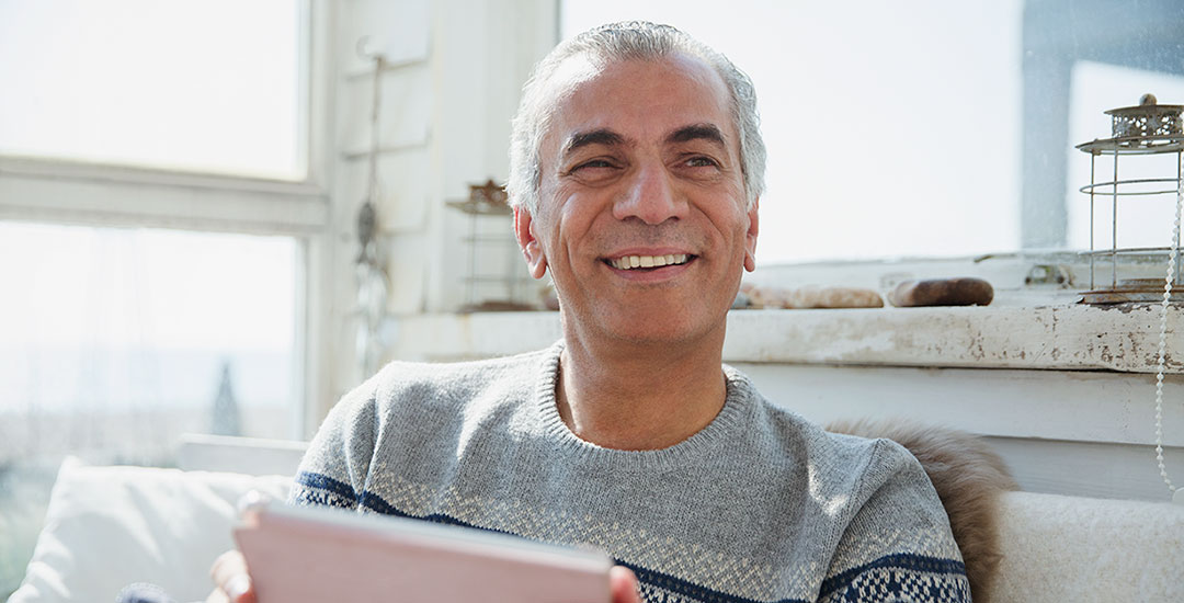 Man on tablet computer