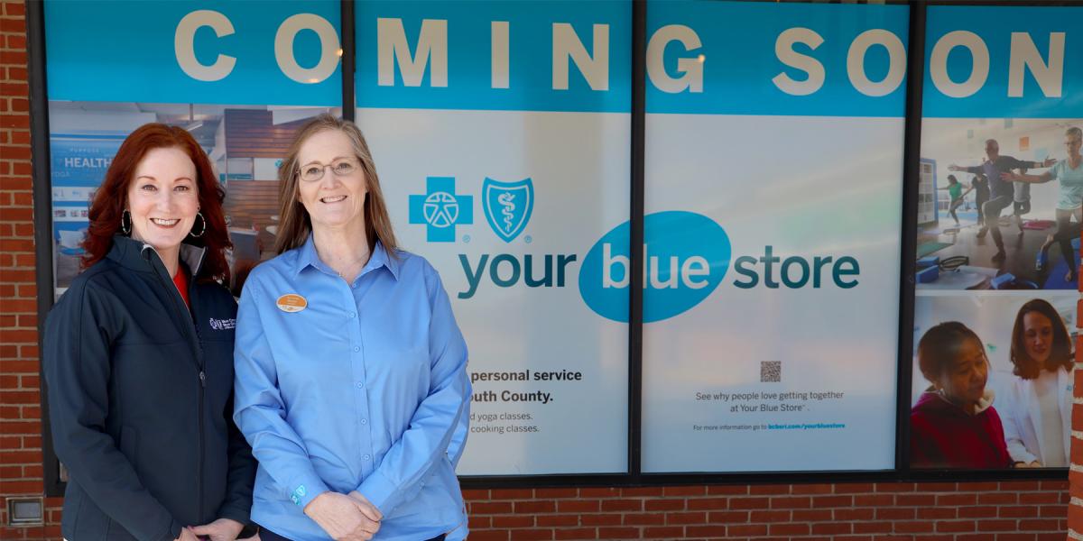 Melissa Cummings, left, executive vice president and chief customer officer for Blue Cross & Blue Shield of Rhode Island, visits the Your Blue Store opening this fall in Narragansett’s Salt Pond Shopping Center. She is accompanied by Donna Therrien, who will be the new store manager.