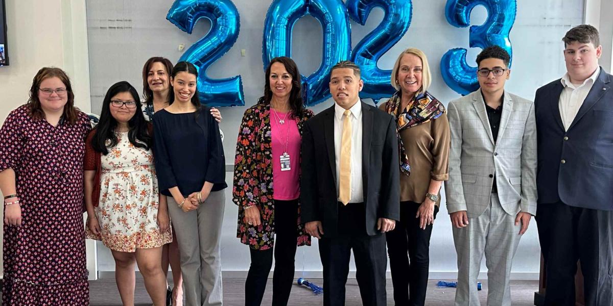 Group shot of graduates and guests: (Left to right) Riley Houde, Jennifer Bolivar, Jeannine Nota-Masse (Superintendent of Cranston Schools), Hilary Canelo-Matias, Michele Simpson (executive director of Cranston Pupil Personnel Services), Jayson Martinez, state Senator Hanna Gallo, Angel Mendez, Ethan Jones