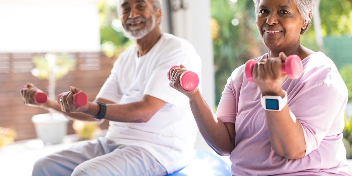 elderly couple exercising