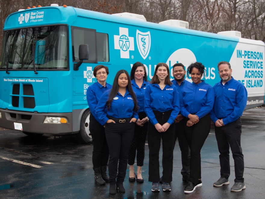 BCBSRI associates in front of Your Blue Bus