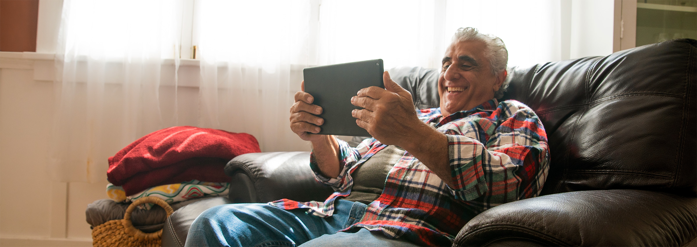 Happy man with tablet