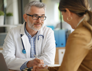 A doctor speaking with a patient